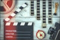 Clapperboard, reel, film and old movie camera Royalty Free Stock Photo