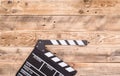 Clapperboard on wood background