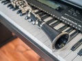 Clarinet lays over the digital keyboard Royalty Free Stock Photo