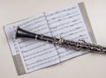 Clarinet lays over the book with notes