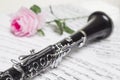 Clarinet with red rose Royalty Free Stock Photo