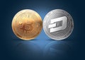 Clash of Bitcoin and Dash coins on a gently lit background with copy space.