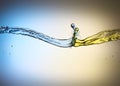 Clash of yellow and blue liquid jets Royalty Free Stock Photo