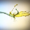 Clash of yellow and blue liquid jets Royalty Free Stock Photo