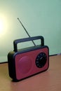 Clasic FM radio in red and black with adjusting frequency