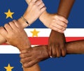 Clasped hands on the background of the flag of Cape Verde