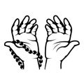 Clasped hands in prayer, hand palms with beads, namaz or Ramadan Muslim pray