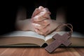 Clasped hands of prayer. Low key photo Royalty Free Stock Photo