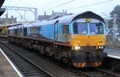 Class 66 diesel locomotive in WH Malcolm livery.