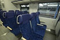 2 class compartment of the wagon of commuter train, seats and doors, nobody Royalty Free Stock Photo