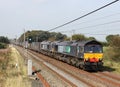 Class 66 diesel locos with a container train. Royalty Free Stock Photo