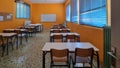 class of elemantary school desk chairs board empty Royalty Free Stock Photo