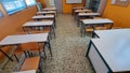 class of elemantary school desk chairs board empty Royalty Free Stock Photo