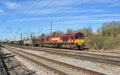 Class 66 hauls freight train through Hitchin