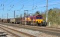 Class 66 hauls freight train through Hitchin