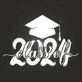 Class of 2024 lettering with graduation hat on chalkboard background. Congratulations to graduates typography poster Royalty Free Stock Photo