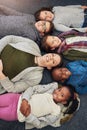 Class photos should look something like this. Portrait of a group of elementary school kids and their teacher lying down Royalty Free Stock Photo