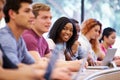 Class Of University Students Using Laptops In Lecture Royalty Free Stock Photo