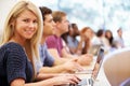 Class Of University Students Using Laptops In Lecture Royalty Free Stock Photo