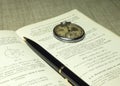 Classbook, pen and old watches Royalty Free Stock Photo