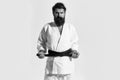 Classes of aikido. bearded karate man, brutal caucasian serious hipster in kimono Royalty Free Stock Photo