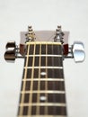 Classic acoustic guitar headstock: pegs, keys Royalty Free Stock Photo