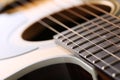 Classic acoustic guitar at weird and unusual perspective Royalty Free Stock Photo