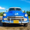 Classic American blue car in Havana, Cuba Royalty Free Stock Photo