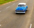 Classic American blue car one of streets in Havana, Cuba Royalty Free Stock Photo