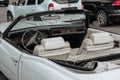 Classic american Cadillac car in store parking. Dashboard of white luxury retro vintage automobile. Royalty Free Stock Photo