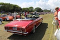 Classic american car driving away Royalty Free Stock Photo