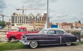 Classic American cars red Chevrolet and Cadillac Royalty Free Stock Photo