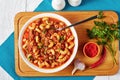 Classic american goulash in a white bowl