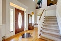 Classic AMerican home entrance interior with staircase.