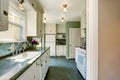 Classic American kitchen room interior in green and white tones Royalty Free Stock Photo