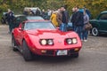 Classic vintage red Chevrolet Corvette coupe front view driving. Royalty Free Stock Photo