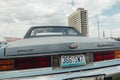 Classic american old full size car Chevrolet Caprice rear end view of trunk and rear lights and badges and logos