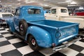 classic American pickup truck from the 50s, it is a blue Chevrolet Advance Design