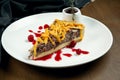 Classic American piece of beef pie with cheddar, cranberry sause and brisket beef on a white plate in a composition with Royalty Free Stock Photo