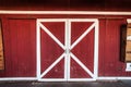 Classic american red and white barn wooden doors Royalty Free Stock Photo