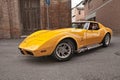 Classic American sports car Cheevrolet Corvette C3 Stingray of the seventies with side pipes exhaust in 24th Meeting auto vintage Royalty Free Stock Photo