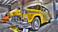 Classic American yellow checkered taxi cab Royalty Free Stock Photo