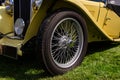 Classic antique car vintage wire wheel Royalty Free Stock Photo