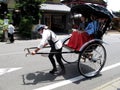 Classic antique vintage retro rickshaw trishaw or bicycle cart for japanese people and foreign travelers use service journey