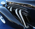 Classic Art-Deco Automobile Chrome Exhaust Pipes Royalty Free Stock Photo