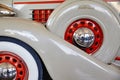 Classic Auburn Wheel Detail and Red Grille Close-Up