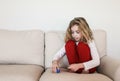 Child with Autism Stacking Toys on Couch Royalty Free Stock Photo