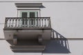 Classic balcony against a white plastered wal Royalty Free Stock Photo