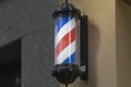 Classic barber pole in Madrid Royalty Free Stock Photo