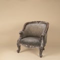 A classic baroque armchair with texture in green and brown isolated on a beige background